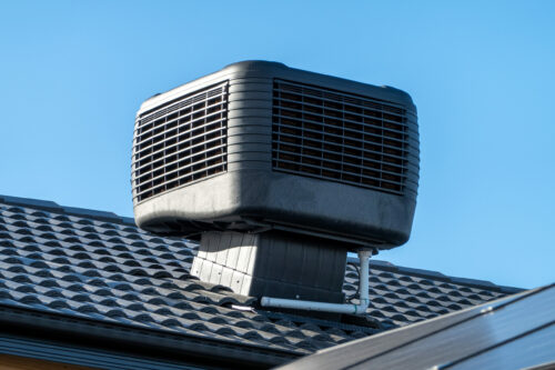 Evaporative cooler installed on roof